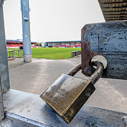 Stadium entrance locked with a padlock